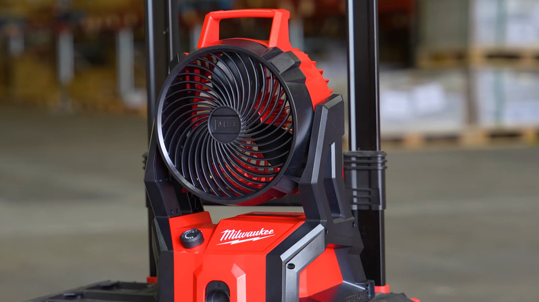 Milwaukee jobsite fan sitting in the middle of room