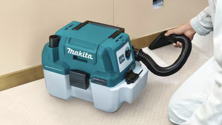 a wet/dry vacuum to clean the floor