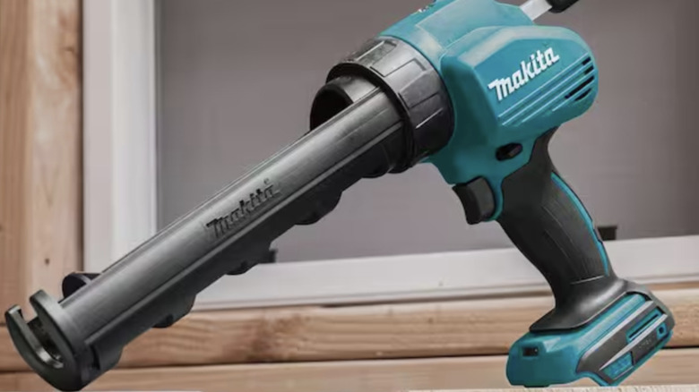 Empty Makita caulk gun without a battery