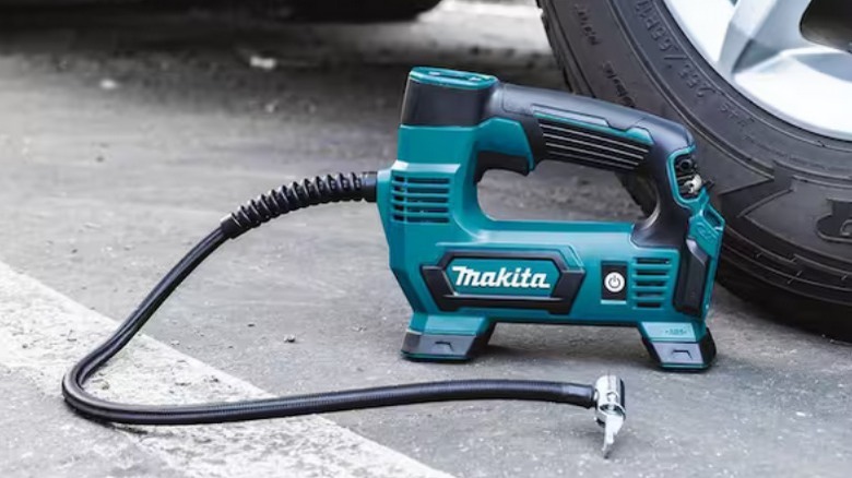 Makita portable inflator on pavement