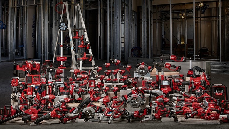 Milwaukee M18 tools on display in a warehouse.