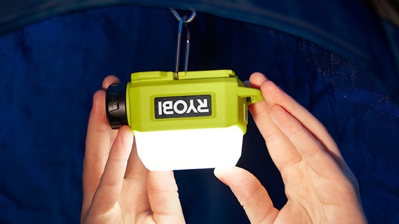 Ryobi area light hanging in tent