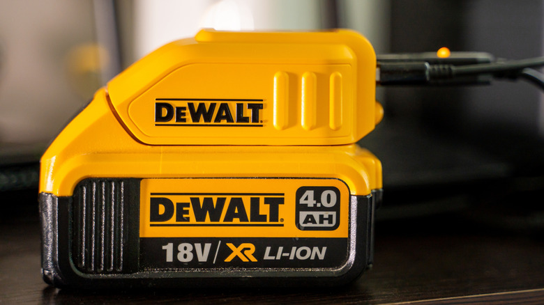 DeWalt 18V 4 Ah battery attached to charger