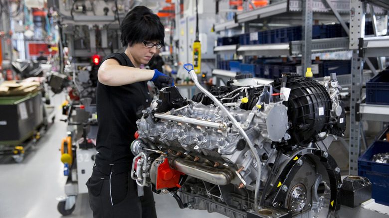 Engineer hand-building an AMG engine