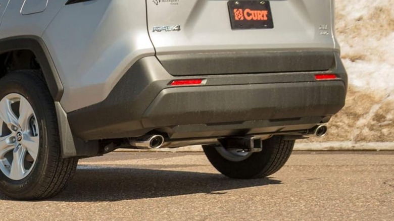 A Toyota Rav 4 rear end with a hitch receiver