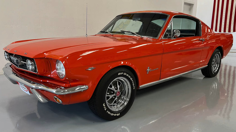 Red Mustang in garage