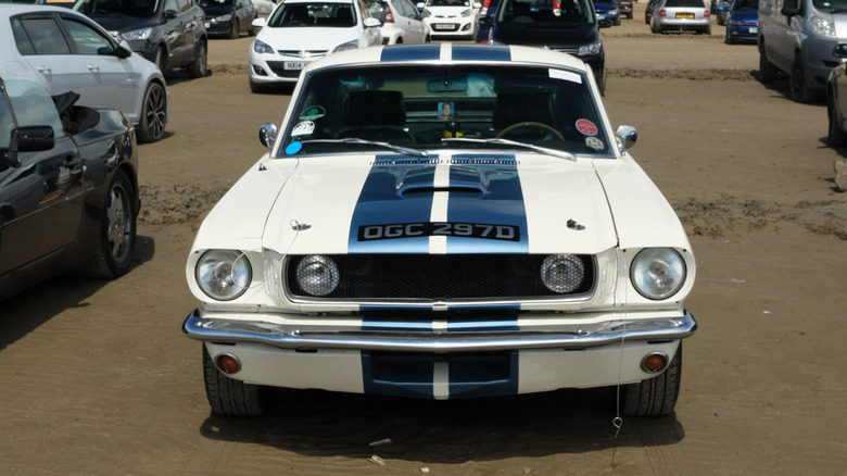 Wimbledon White Mustang in parking lot