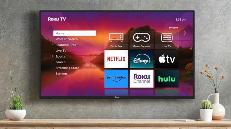 Roku 32R2A5R FHD mounted on wall over table