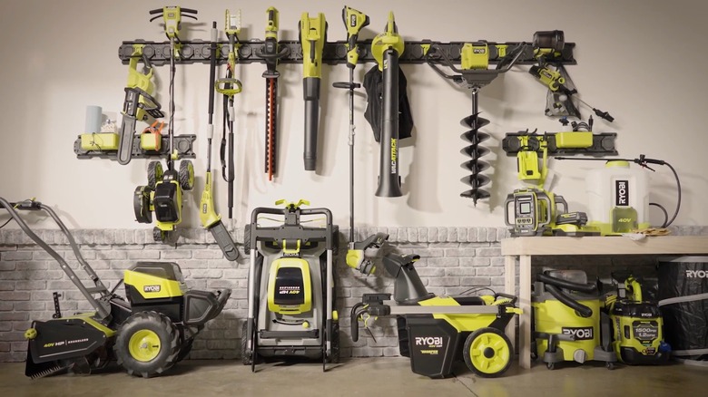 Ryobi 40v tool collection in garage