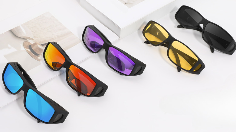 Five pairs of Tnnaiko sunglasses in different colors on a white background