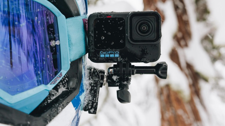 GoPro and GoPro Helmet Front + Side Mount attached to helmet in snow