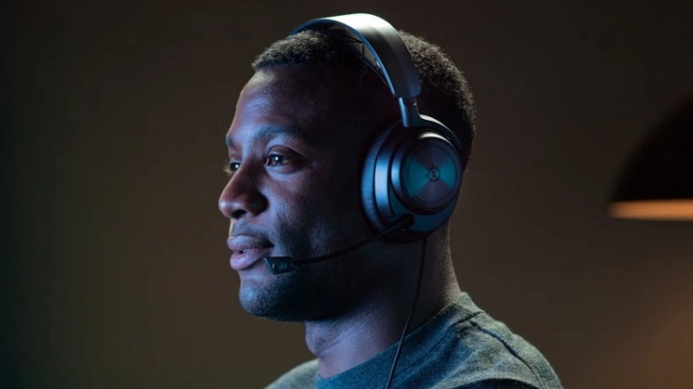 Person wearing SteelSeries gaming headset