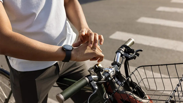 cyclist using Google Pixel Watch 2