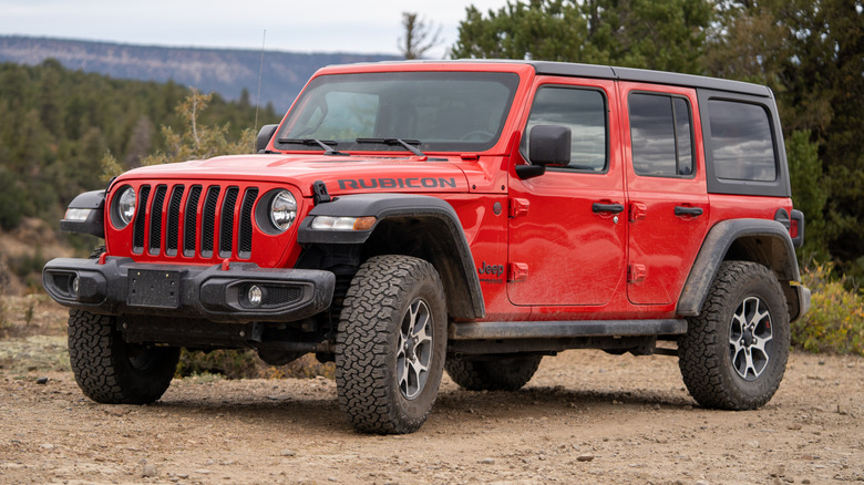 Red Jeep Wrangler off road