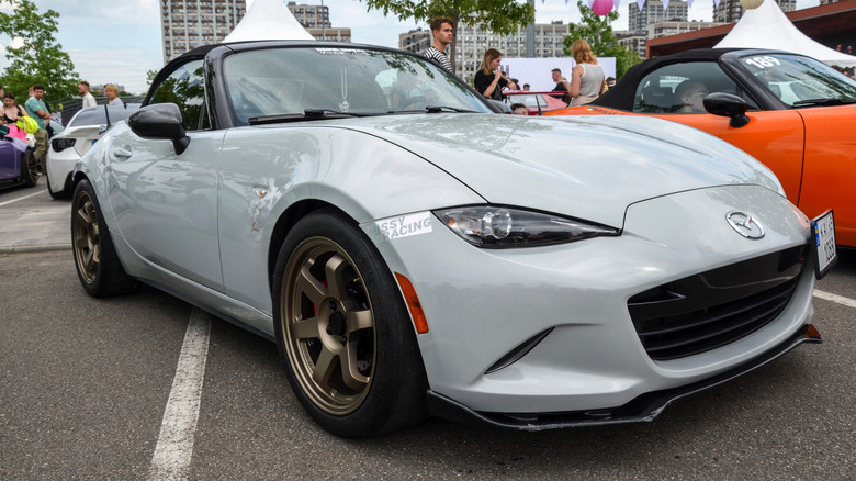 White MX-5 Miata at fair