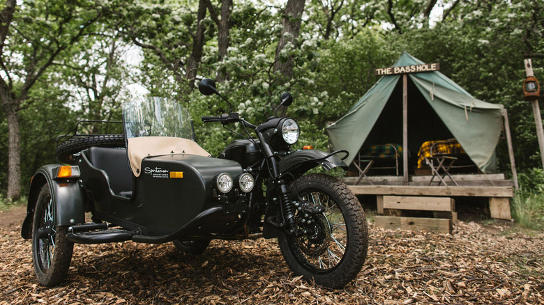 Ural Gear Up Sportsman parked outside glamping site