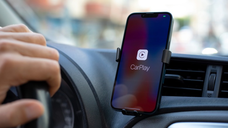 iPhone with CarPlay app on the screen