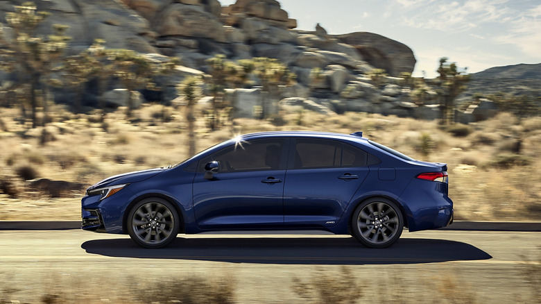 Toyota Corolla Hybrid driving on a desert road