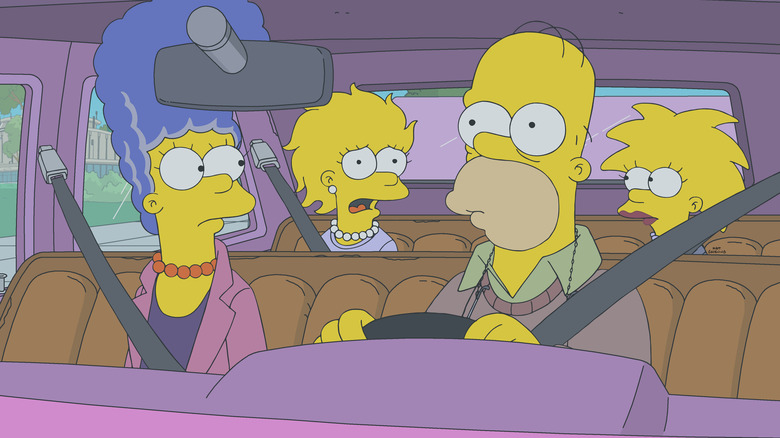 The Simpsons sitting in the car