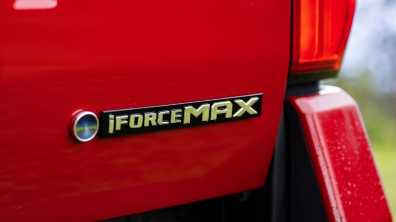 Toyota Tacoma i-Force MAX hybrid badge