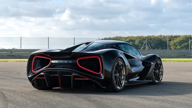 Back of the Lotus Evija at a field