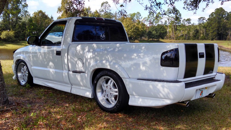 A 1999 Chevrolet S-10 Xtreme parked in the shade.