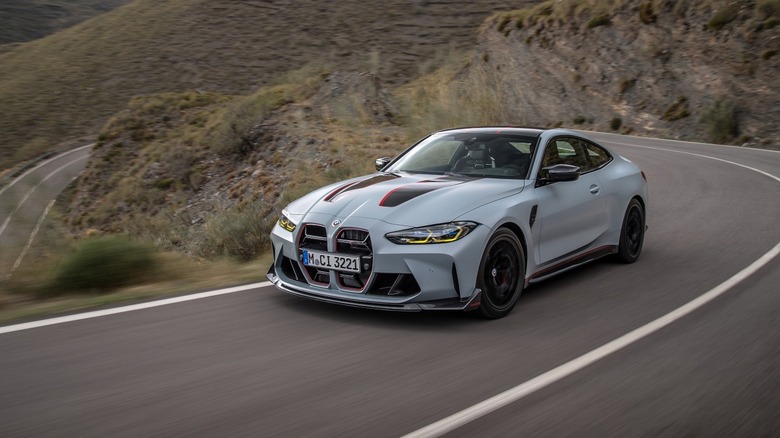 Front-left 3/4 action shot of the BMW M4 CSL