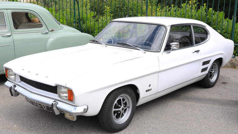 White Ford Capri in parking lot