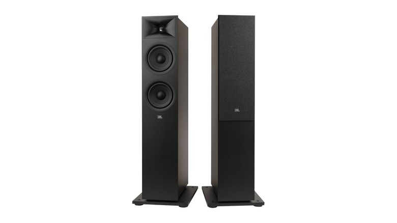 A set of black jbl stage 260f floor speakers