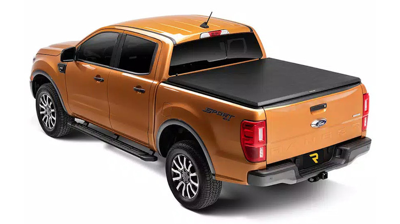 orange ford truck with truxedo truxport cover