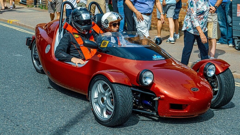 Red Grinnall Scorpion III raced on road