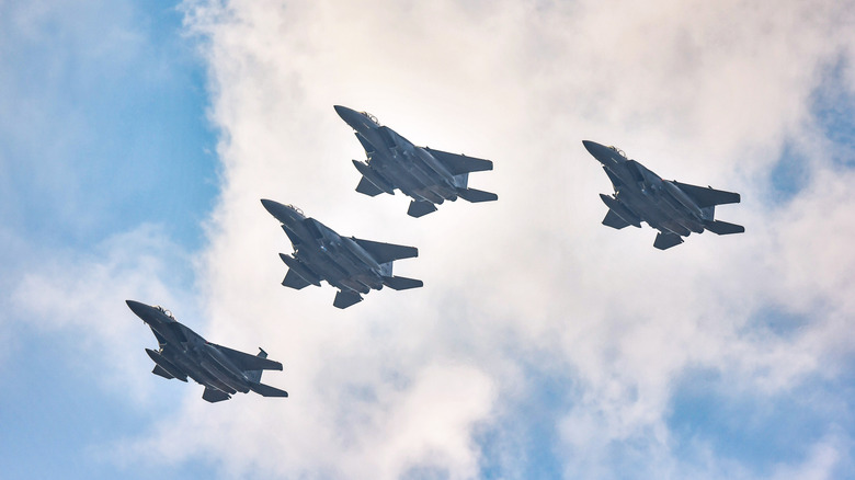 Four F-15 Eagles in flight formation