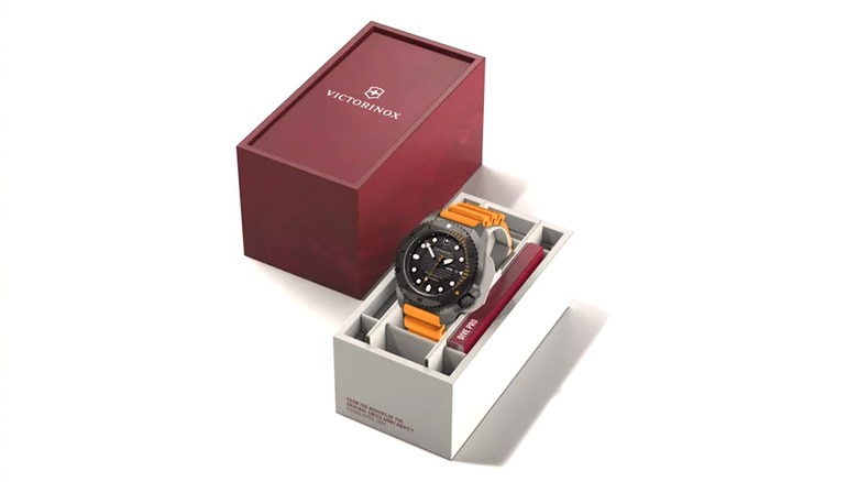 Victorinox Diving watch with orange band displayed in box