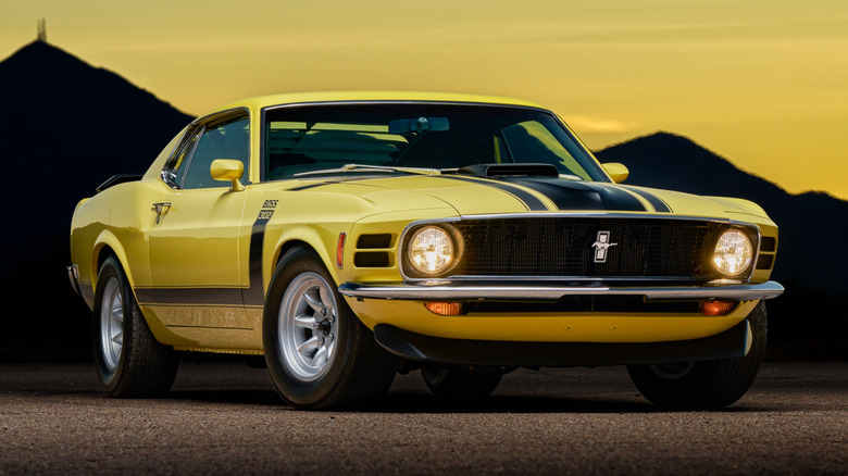 Yellow 1970 Mustang Boss 302 parked front end