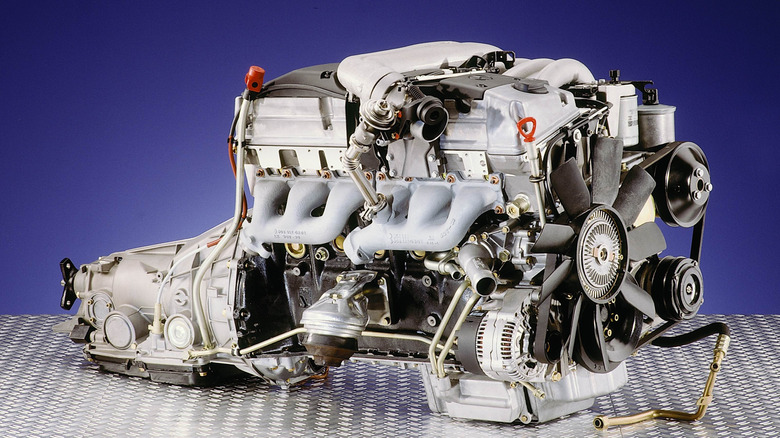 Mercedes-Benz diesel engine OM 606 resting on metal surface