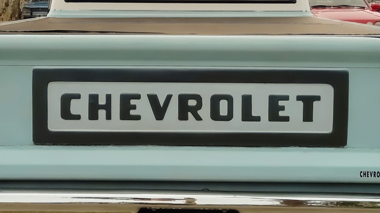 CHEVROLET painted on old pickup tailgate