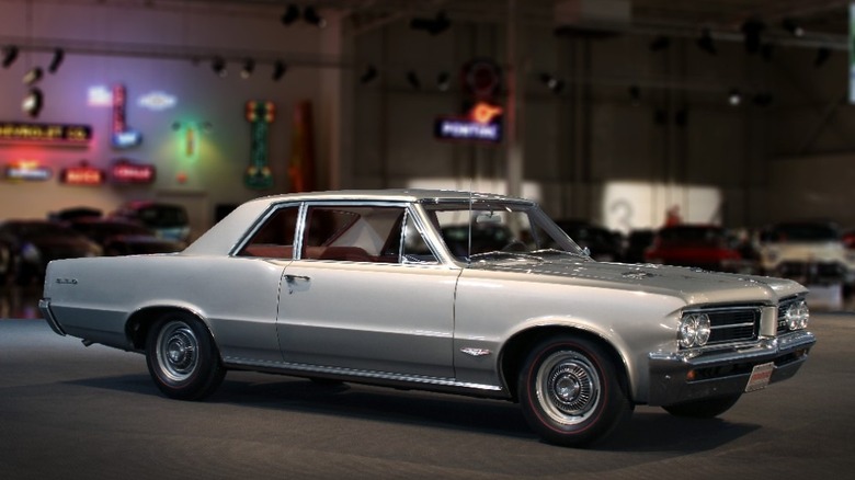 Front 3/4 view of silver 1964 Pontiac GTO