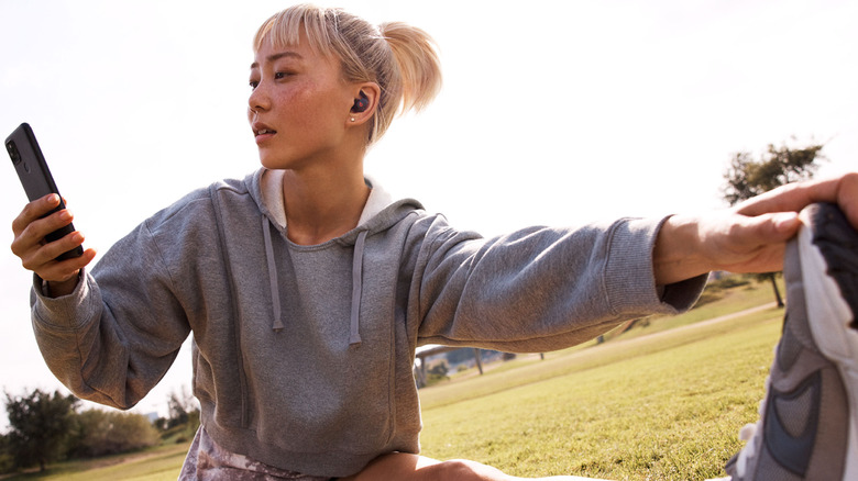 Woman wearing Beats Fit Pro