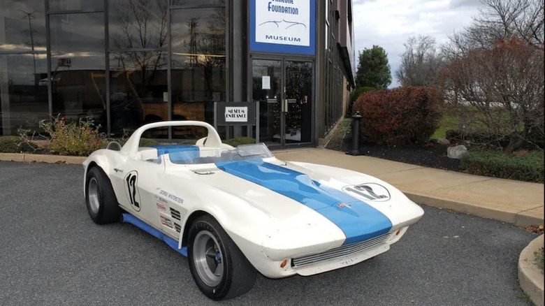 1963 Chevrolet Corvette Grand Sport parked in front of museum