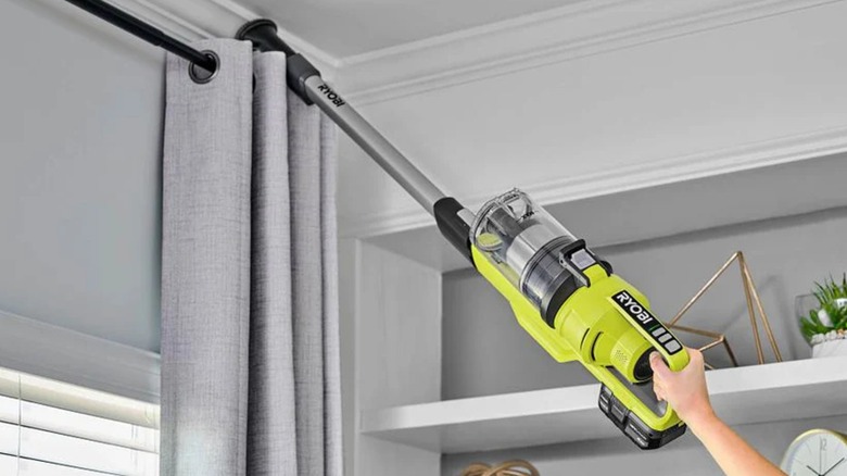 18V One+ Mesh Filter Stick Vacuum used to clean ceiling