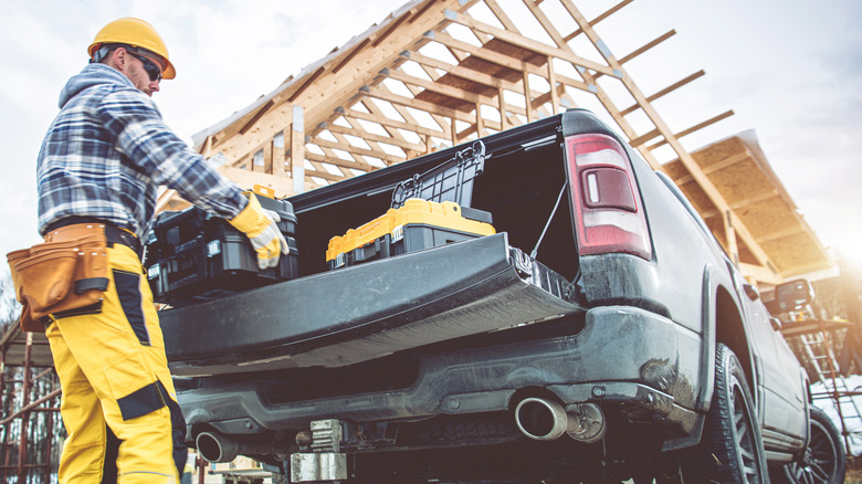 Man unloading his goods from a pickup