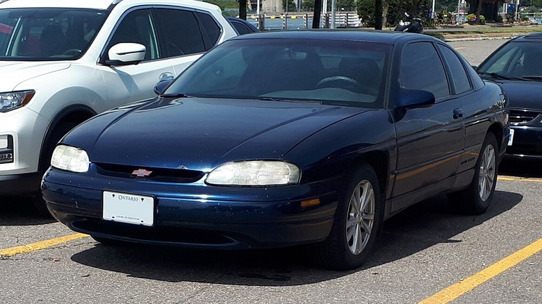 Blue Chevrolet Monte Carlo parked