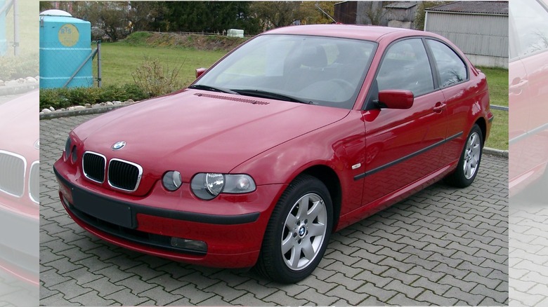 a red BMW 3 Series (E56) Compact