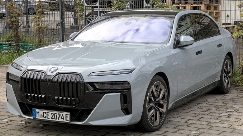 a BMW 7 Series in a parking lot