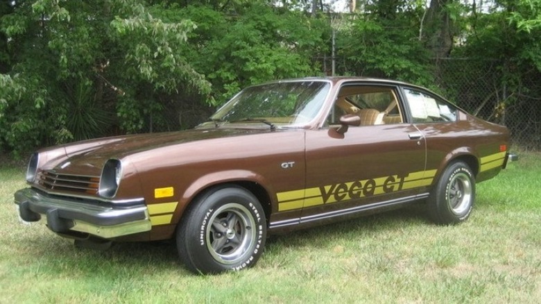 A 1977 Chevrolet Vega GT with racing stripes and window louvers