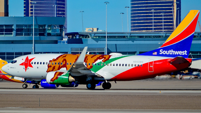 Southwest Airlines' California One jet parked at an airport.