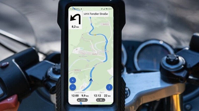 Phone mounted on motorcycle with Kurviger app running