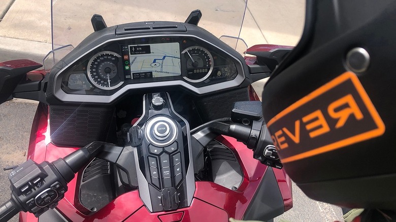 REVER app running on Apple CarPlay, on a motorcycle.