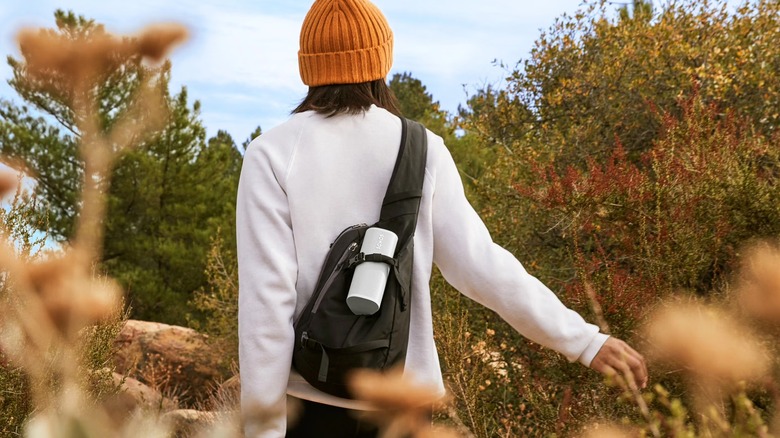 Sonos Roam 2 on a hiker's backpack