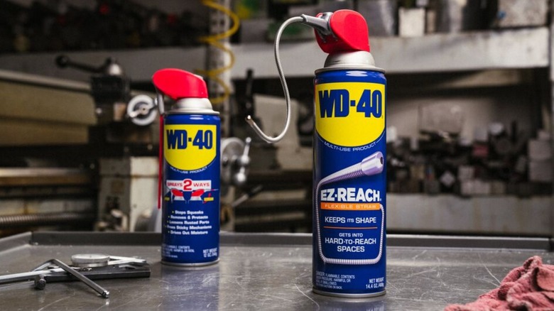 WD-40 cans on workbench